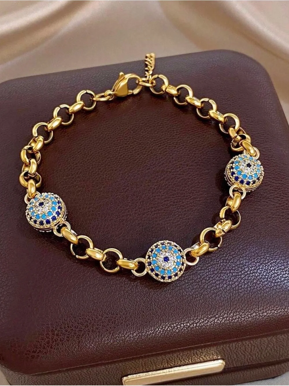 Gold-Tone Bracelet with Blue and White Crystal Discs
